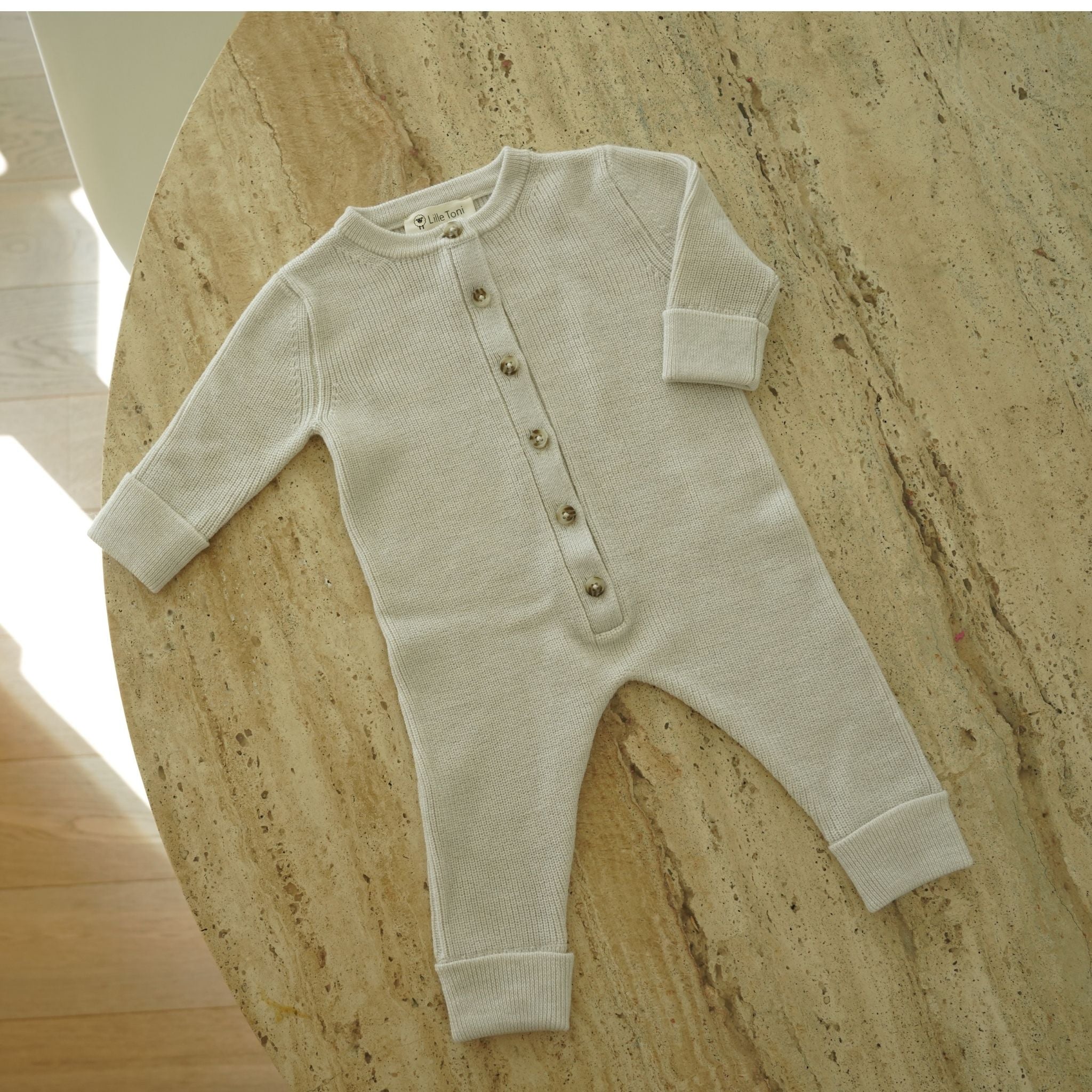 Strampler Thea in creme