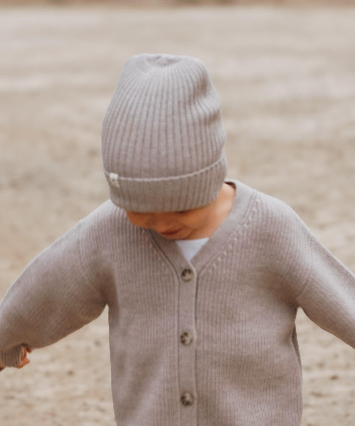 Kids (1-5 Jahre) - zwei Kinder in Merinowolle-Strick